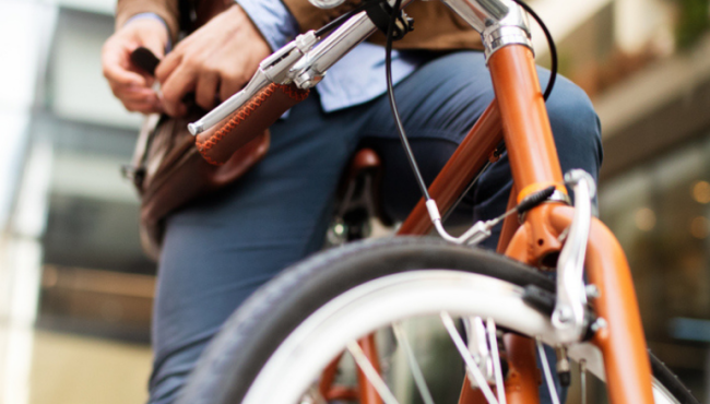 male cyclist sitting on bike