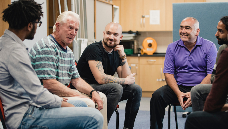 group of men talking