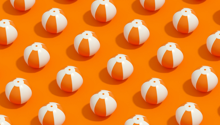 beach balls on orange back ground