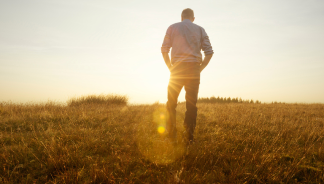 man staring at sun