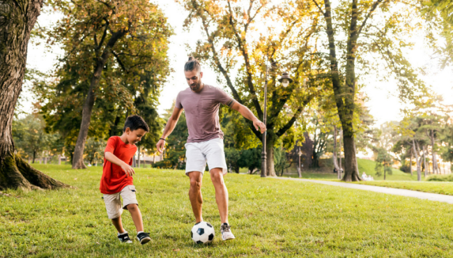 man and son exercising