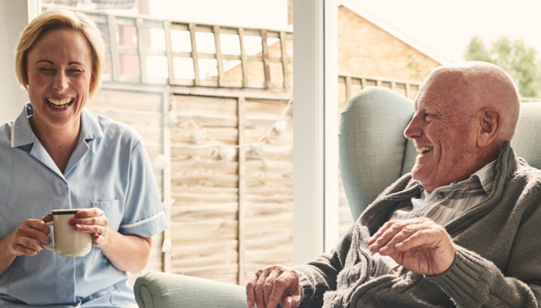 nurse and older male patient