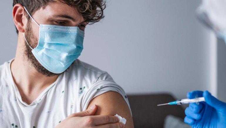 man getting vaccinated